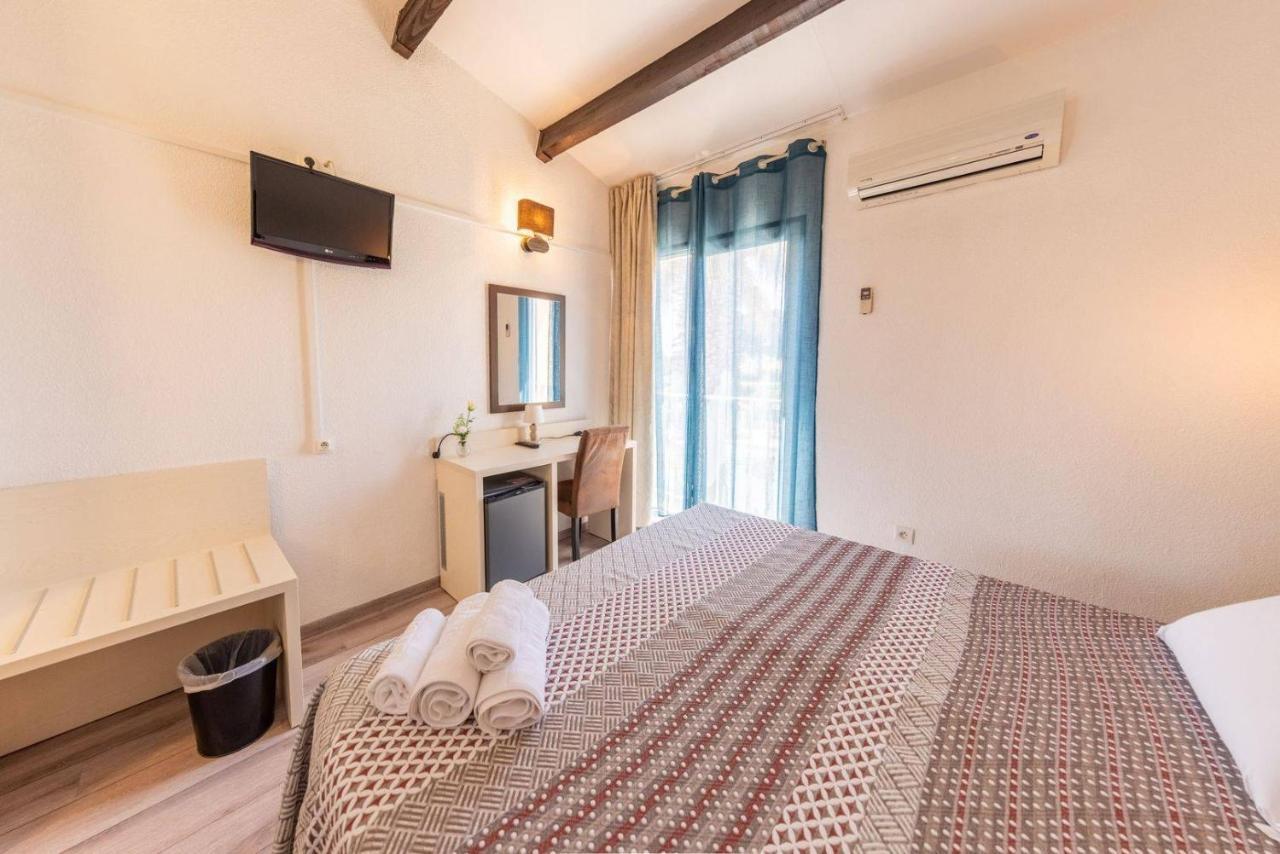 Brit Hotel Confort Helios แอกด์ ภายนอก รูปภาพ